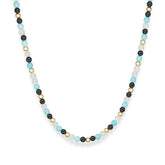 Men's beaded necklace with turquoise, clear quartz, and onyx on white background